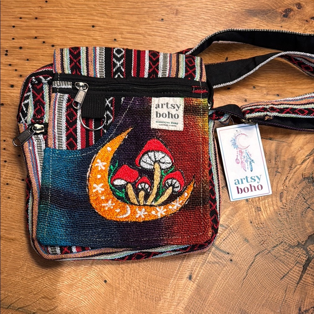 Red and Black Crossbody Bag with Patchwork Design and Vibrant Appliqué